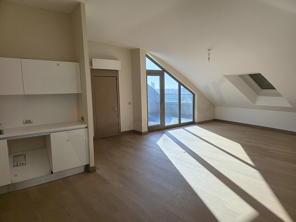 Elegant dining room set, wooden table and cream-colored chairs.