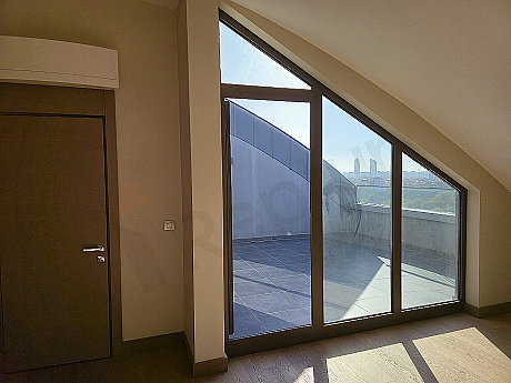 Luxurious duplex apartment with a spacious balcony.