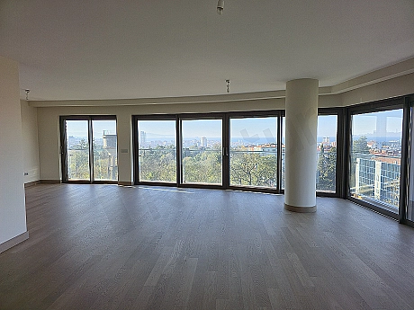 Luxurious living room interior, modern design furniture and large windows.