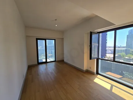 Modern and spacious apartment balcony overlooking the city view.