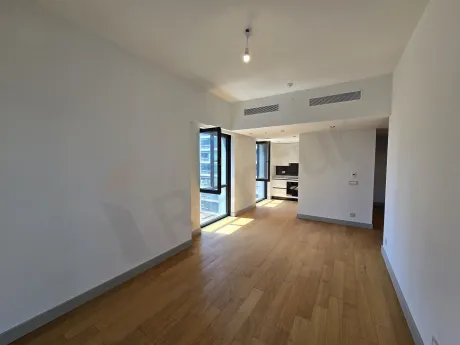 A spacious and modern living room view with large windows and contemporary design.