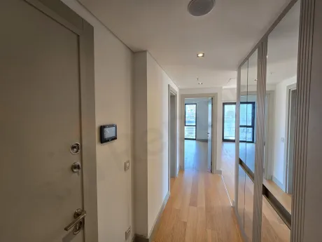 Entrance door and hallway area of a modern apartment.