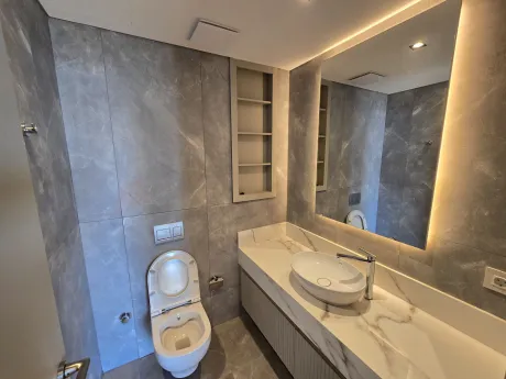 A luxury bathroom area with modern design, stylish ceramics, and fixtures.