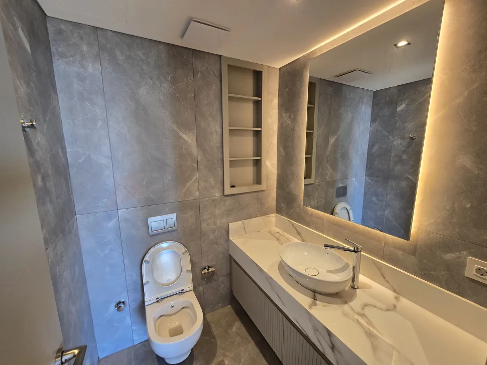 A luxury bathroom area with modern design, stylish ceramics, and fixtures.