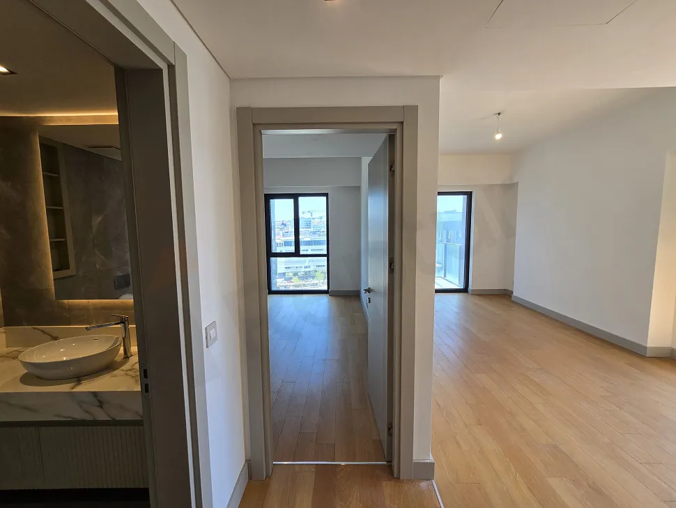 Elegant and modern internal staircase design within a luxury apartment.
