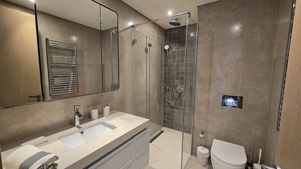 Spacious and luxury villa bathroom with a modern and stylish design.