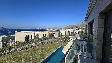 Panoramic sea and coastline view from a luxury beachfront villa in Bodrum.