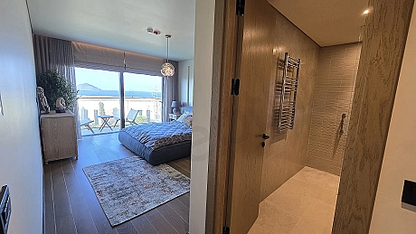 Bright bedroom area of a modern and spacious villa