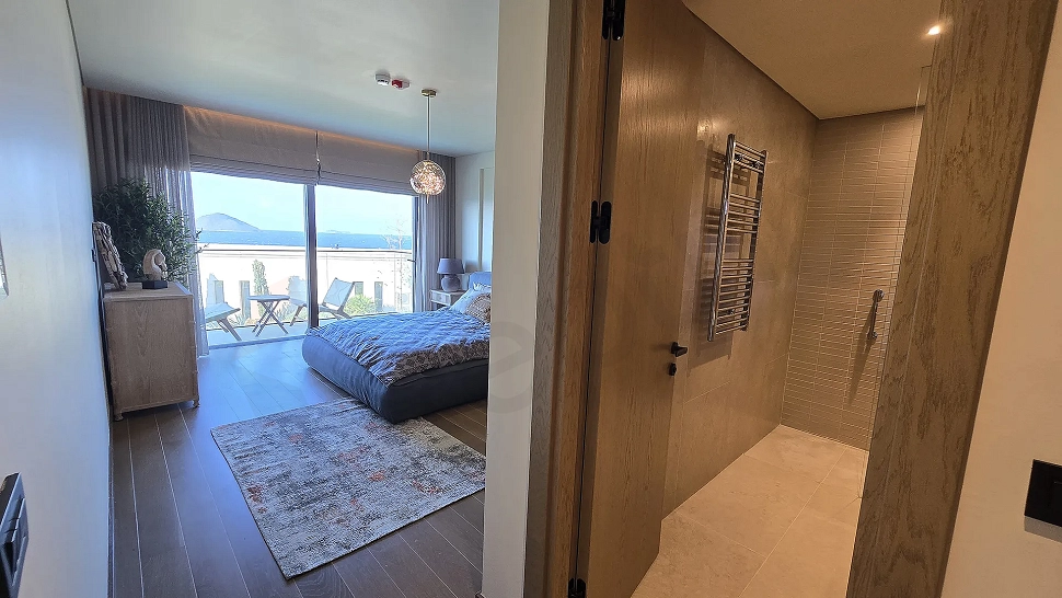 Bright bedroom area of a modern and spacious villa