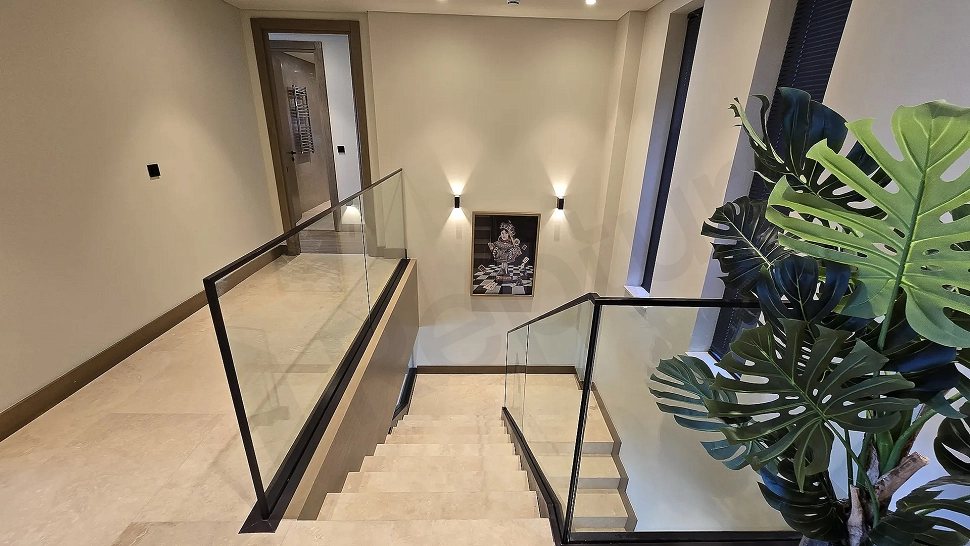 Elegant and aesthetically designed interior staircase within a modern villa.