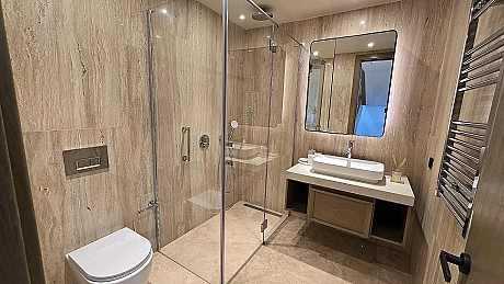 Modern designed, spacious and bright villa bathroom.