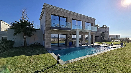 Modern architectural exterior view of a luxury seafront villa located in Bodrum.