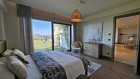 Bright and modern bedroom visual with a spacious design in a luxury villa for sale in Bodrum.