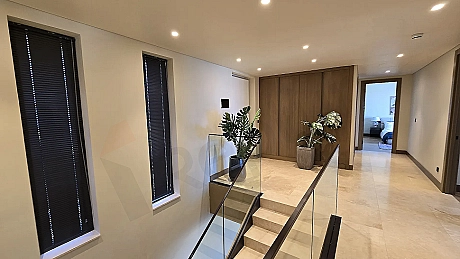 Modern and stylish interior staircase of a luxury villa.