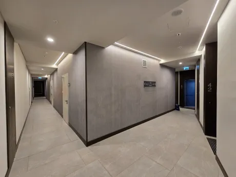 Spacious and bright hallway view of a modern residence apartment.