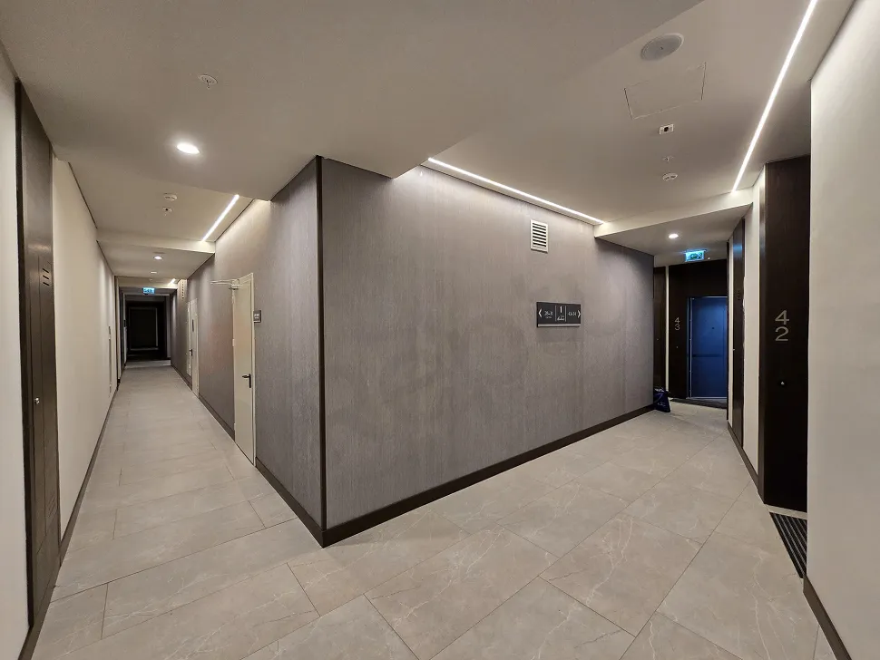 Spacious and bright hallway view of a modern residence apartment.