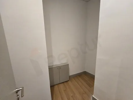 Modern and spacious apartment storage unit area.