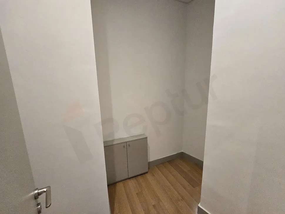Modern and spacious apartment storage unit area.