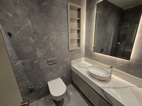 Stylish and modern bathroom interior design of a contemporary apartment.