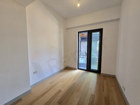 Spacious and modern bedroom image of a 2+1 residence apartment for sale in Sisli, Istanbul.