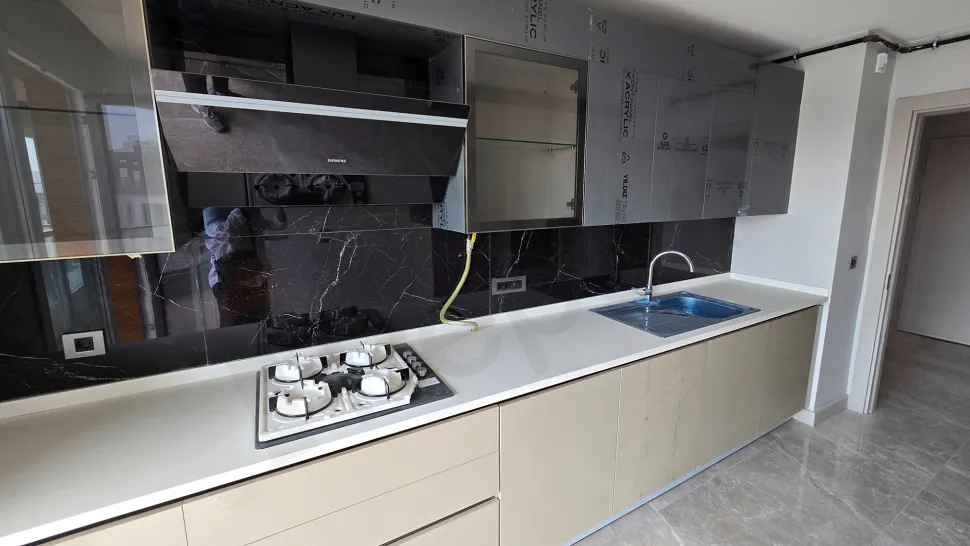 Top-Floor 4+1 Duplex: Dual Views & Massive Terrace