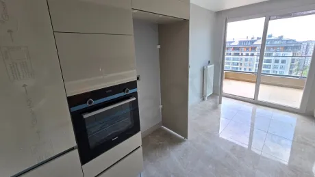 Top-Floor 4+1 Duplex: Dual Views & Massive Terrace