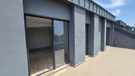 Top-Floor 4+1 Duplex: Dual Views & Massive Terrace