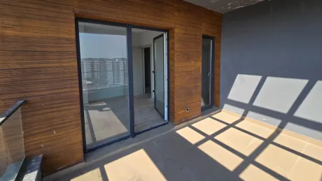 Spacious balcony of a duplex apartment with a city view located in Beylikdüzü, Istanbul.