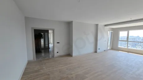 General view of a spacious and modern sitting room.