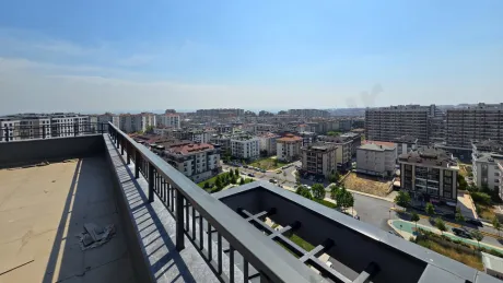 Spacious and modern balcony area of a contemporary building.