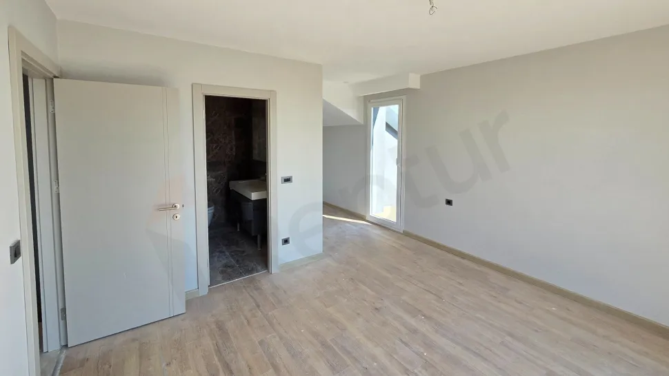 Spacious and modern bedroom interior design of a duplex apartment in Beylikdüzü, Istanbul.