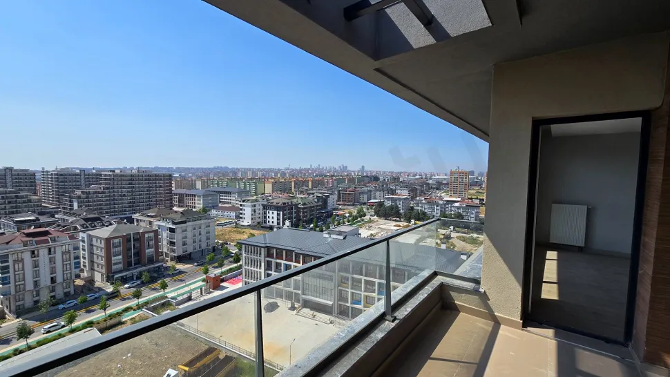 Spacious and modern design balcony with a panoramic city view.