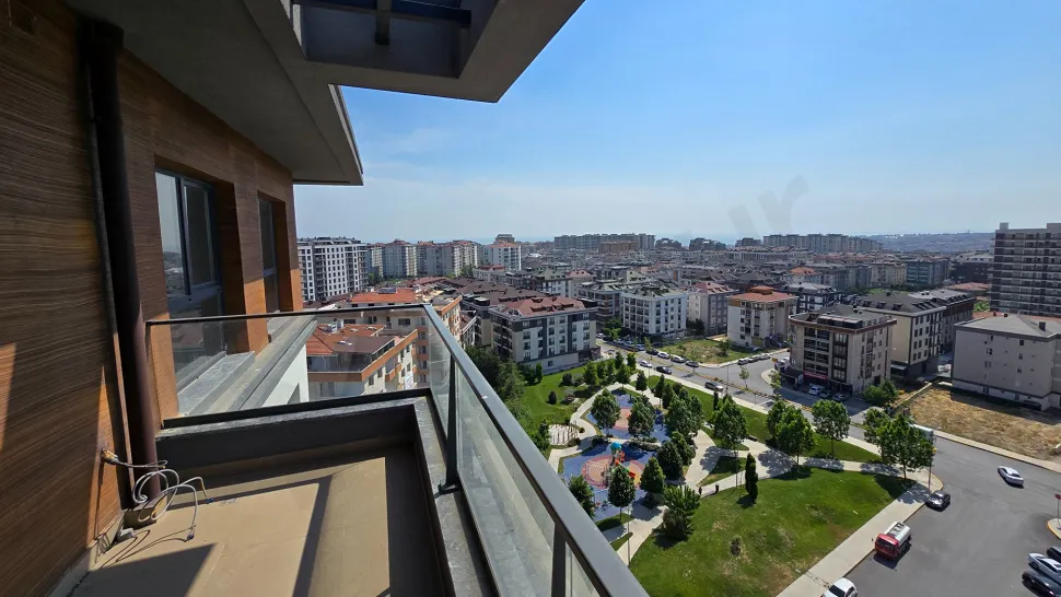 Balcony view of a modern and spacious duplex apartment with a city view.