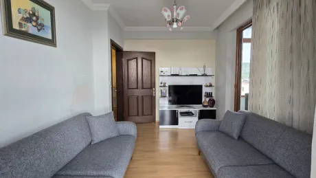 A spacious and bright living room area with modern architecture.