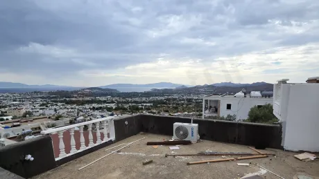 Spacious terrace of a duplex apartment with a sea view in Bodrum.