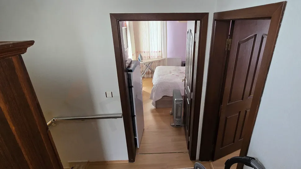 Interior view of a modern and spacious bedroom.