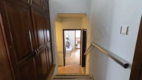 Interior view of a modern and spacious house corridor.