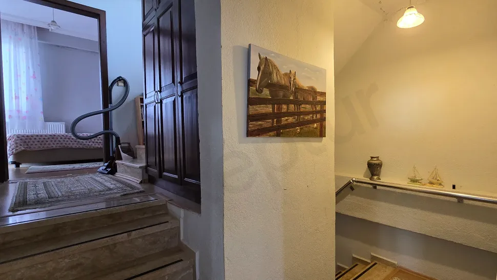 Spacious and bright corridor of a modern duplex house.