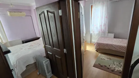 Spacious and bright bedroom area of the duplex apartment for sale in Bodrum.