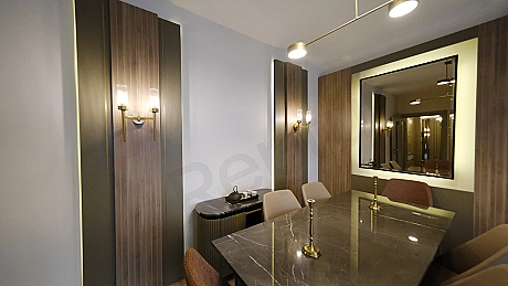 Stylish dining room image. Wooden table and chairs, modern design.