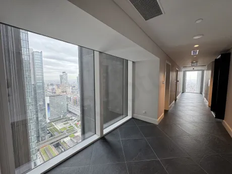 A modern and bright luxury apartment corridor view.