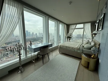 Elegant and comfortable bedroom interior decorated with modern furniture.