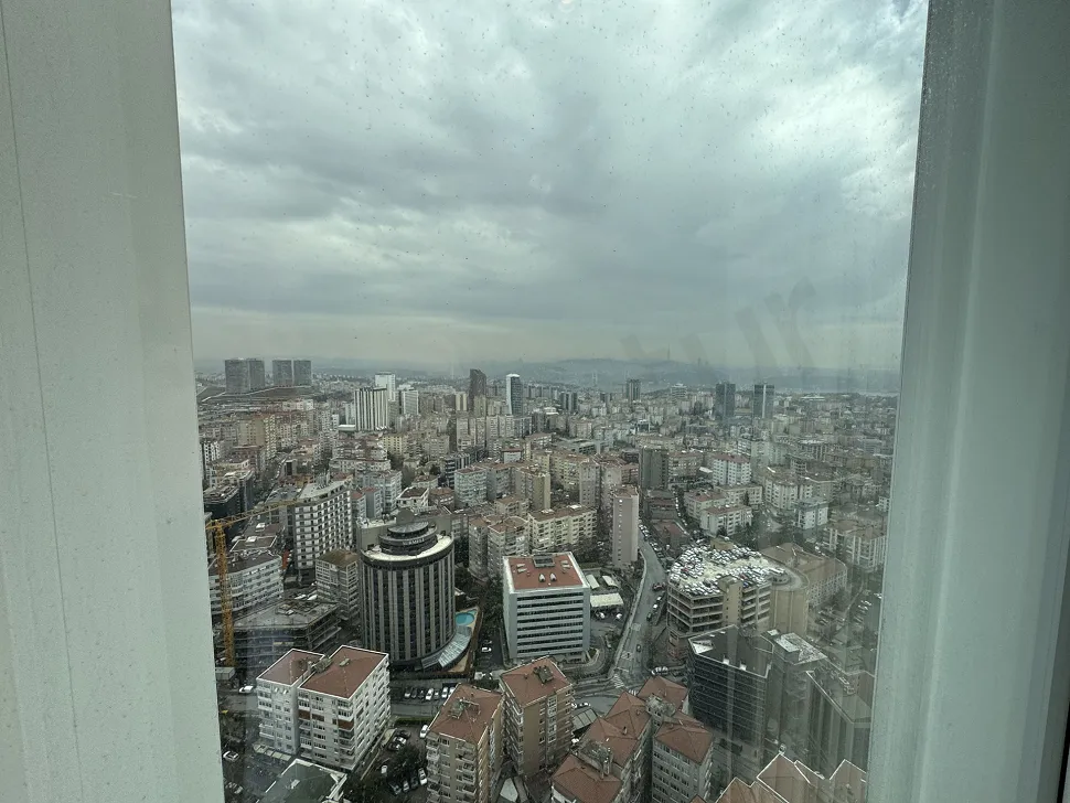 Panoramic Istanbul city view seen from a high-floor apartment in Sisli.