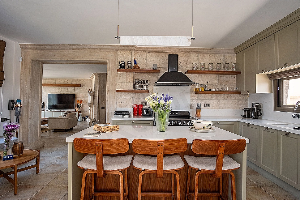 Modern designed, spacious and bright mansion kitchen.