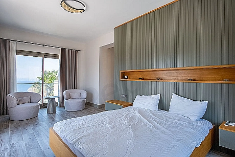 Spacious and bright bedroom.