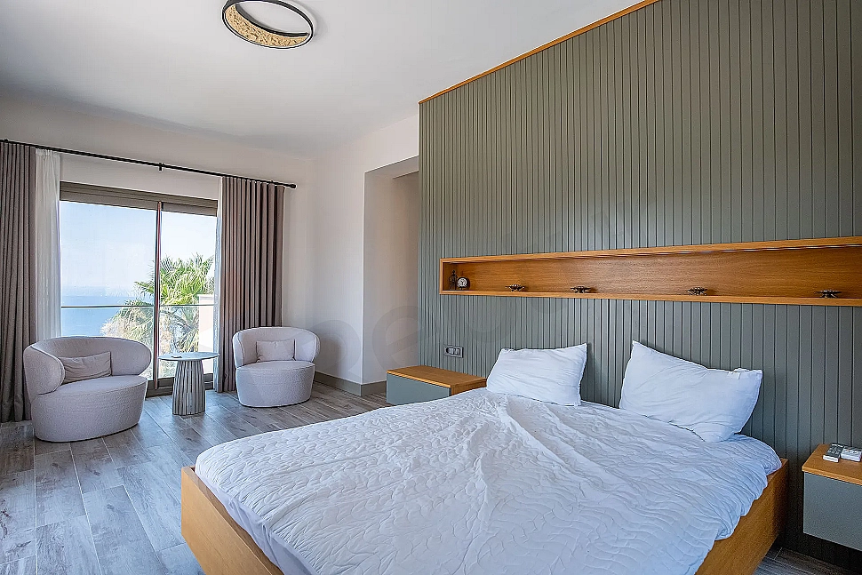 Spacious and bright bedroom.