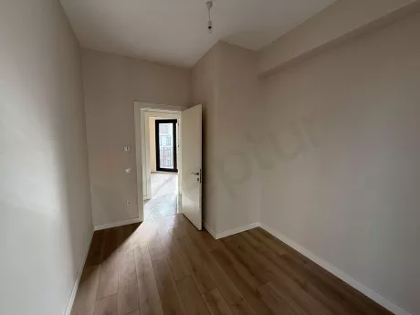 Spacious and bright bedroom view of a modern 3+1 apartment located in Istanbul Cekmekoy.
