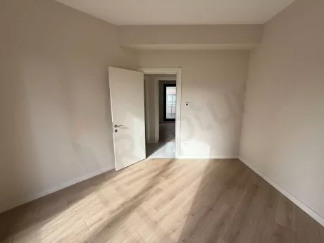 Spacious and bright bedroom area of the modern apartment for sale in Çekmeköy, Istanbul.