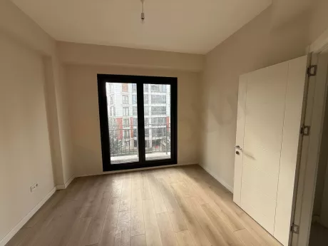 Bright and modern bedroom with large windows