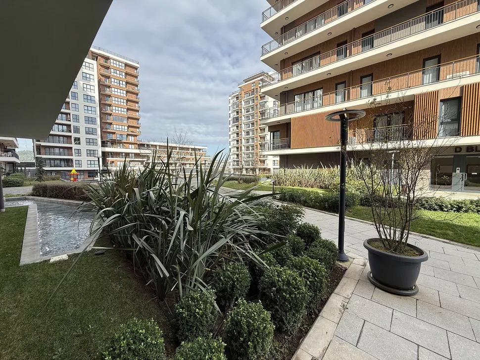 Spacious landscaped garden and green area view of a modern residential project.